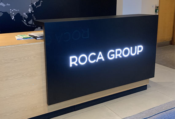 Roca Reception Desl Cladding and illumination - Design by Red Sheep Creative.